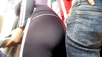 Sporty flexible lady sucks in two microphones